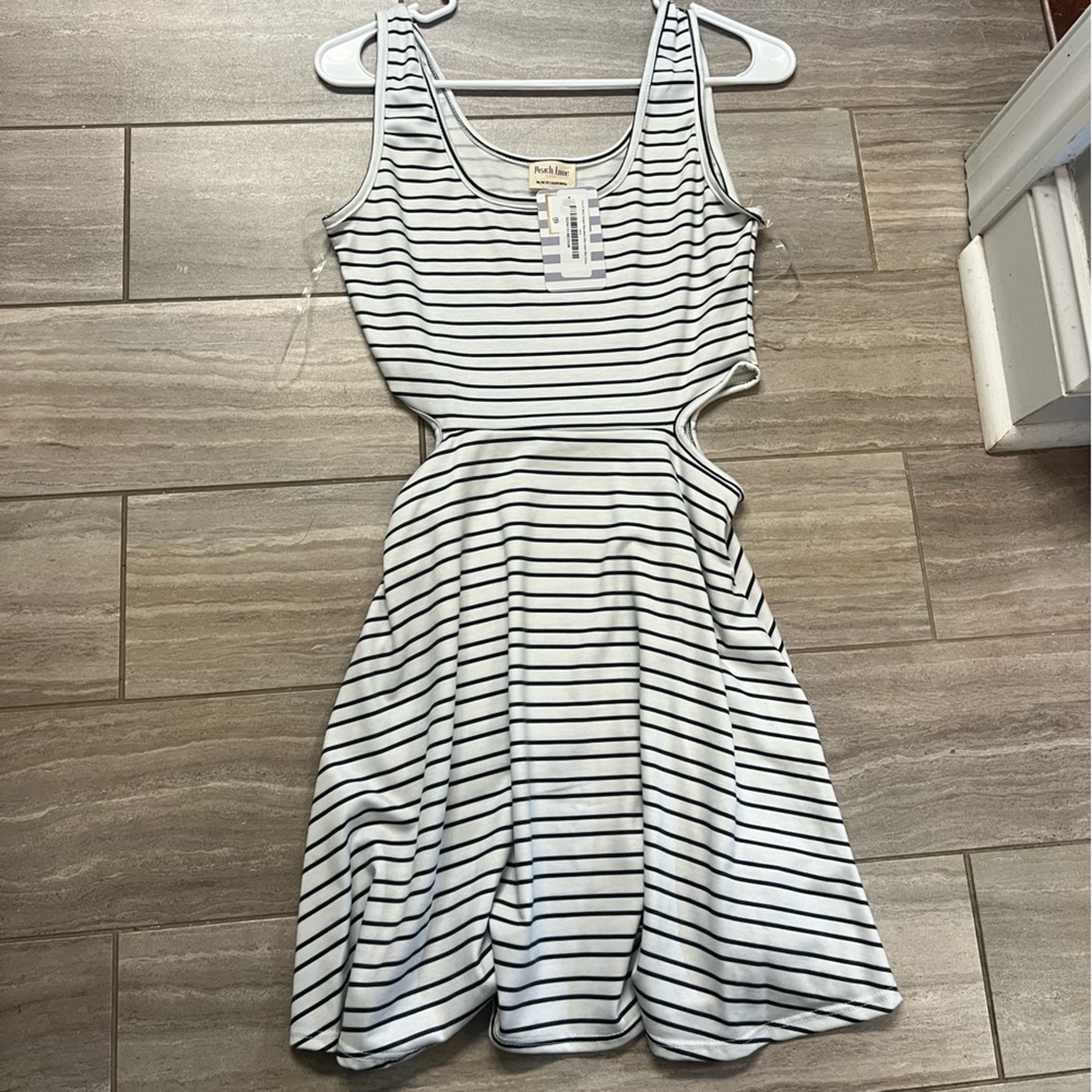 NWT Dress with cutout sides.
